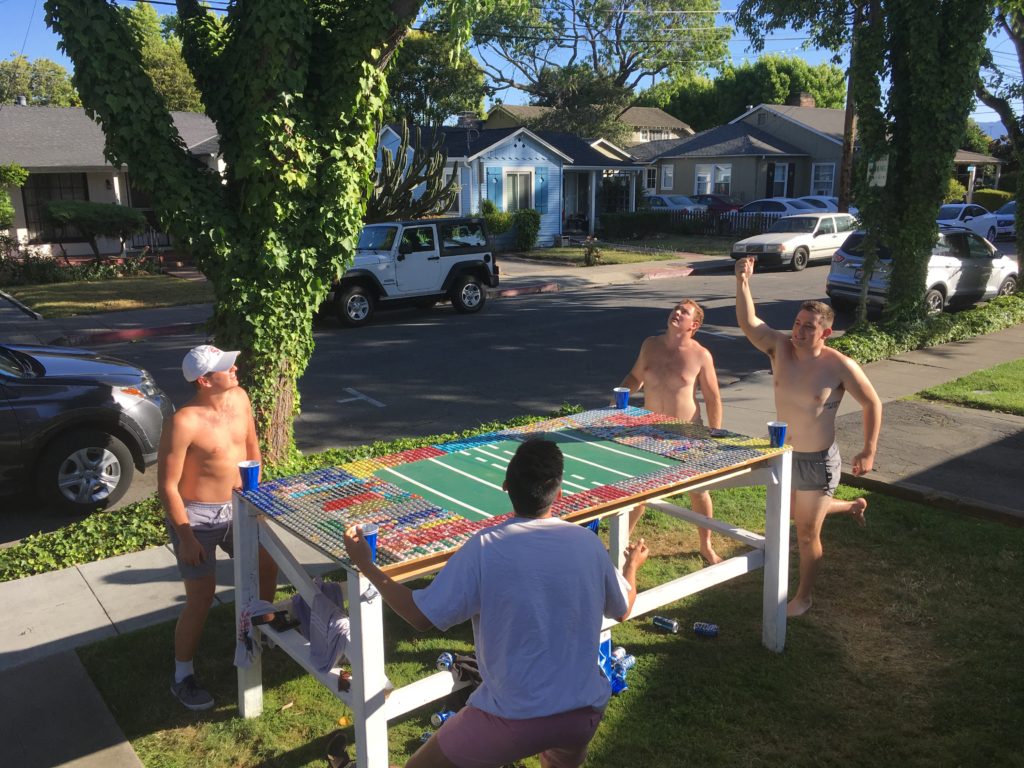 people playing beer die